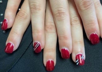 glitter red with white and black stripe nails